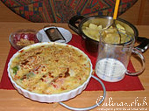 Порей с ветчиной,запечённый с двумями видами сыра.